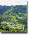 Small town in Ukraine located in between mountains.